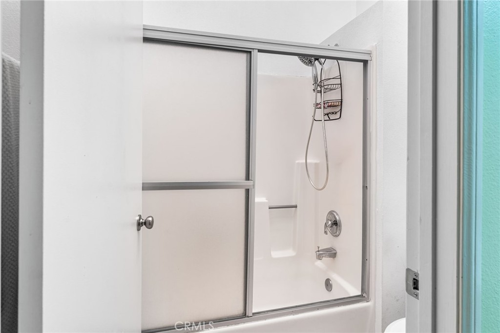 515 South Madison Avenue, Unit 2 Pasadena, CA 91101 - Photo 26 of 35 a bathroom with a glass shower door