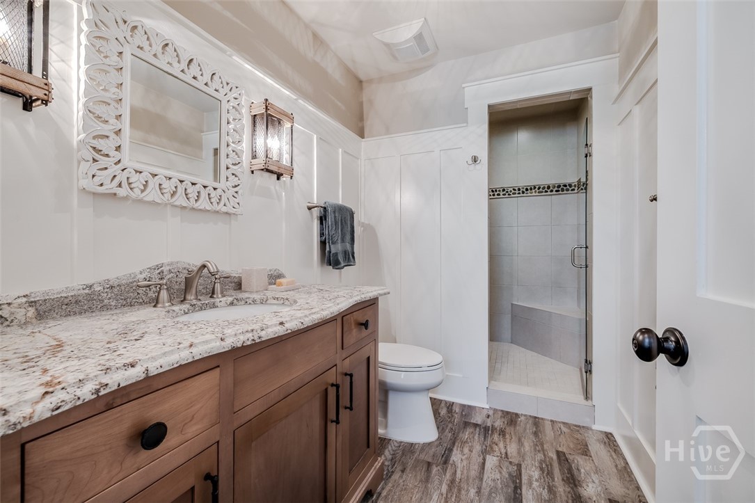 36 Oldfield Village Road Bluffton, SC 29909 - Photo 57 of 74 Cottage bathroom with walk in tiled shower