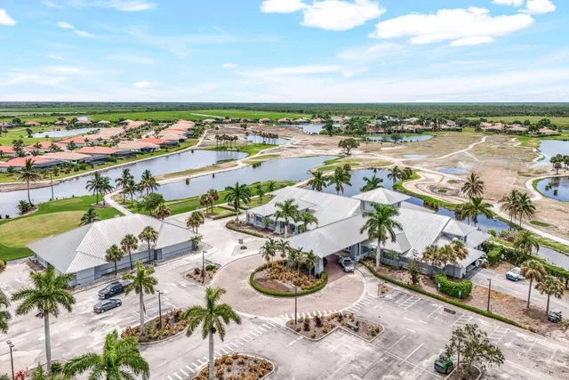 an aerial view of a house with outdoor space