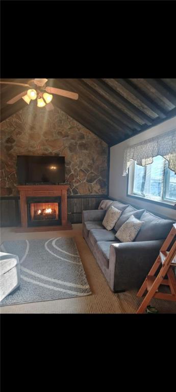 162 Tent Church Road Uniontown, PA 15401 - Photo 6 of 27 a living room with furniture a fireplace and a floor to ceiling window