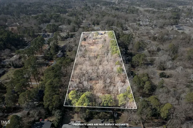 an aerial view of residential house with outdoor space