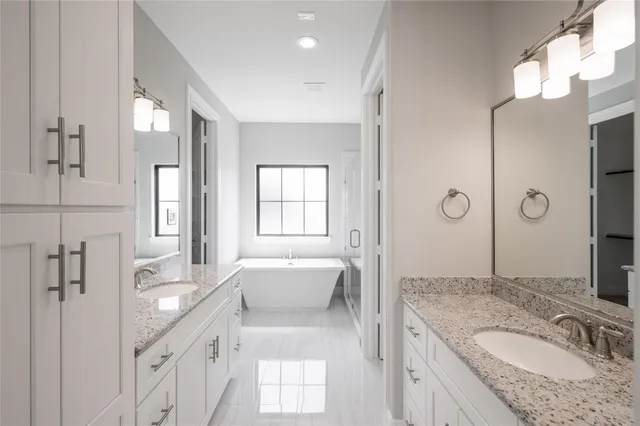 a view of a kitchen with furniture and wooden floor