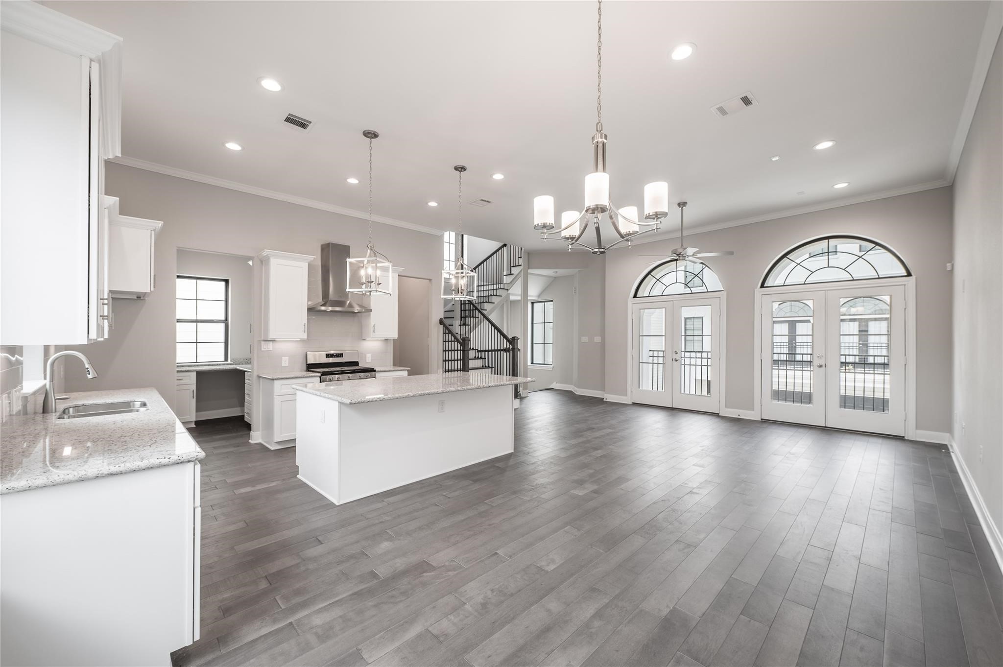 3327 Beverly Forest Drive Houston, TX 77057 - Photo 9 of 12 a view of a kitchen with furniture and wooden floor