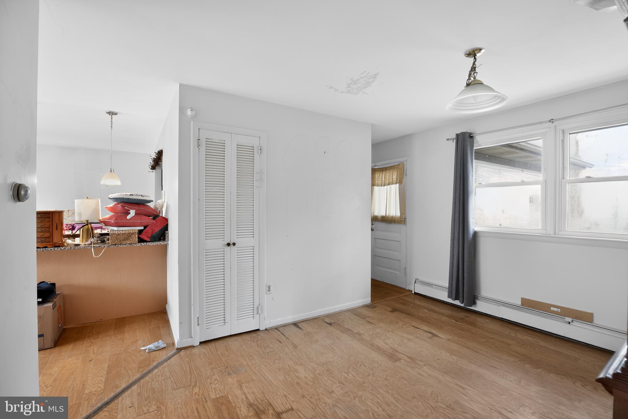 4144 Fox Trail Road Havre de Grace, MD 21078 - Photo 27 of 39 a view of a livingroom with hardwood floor and a ceiling fan