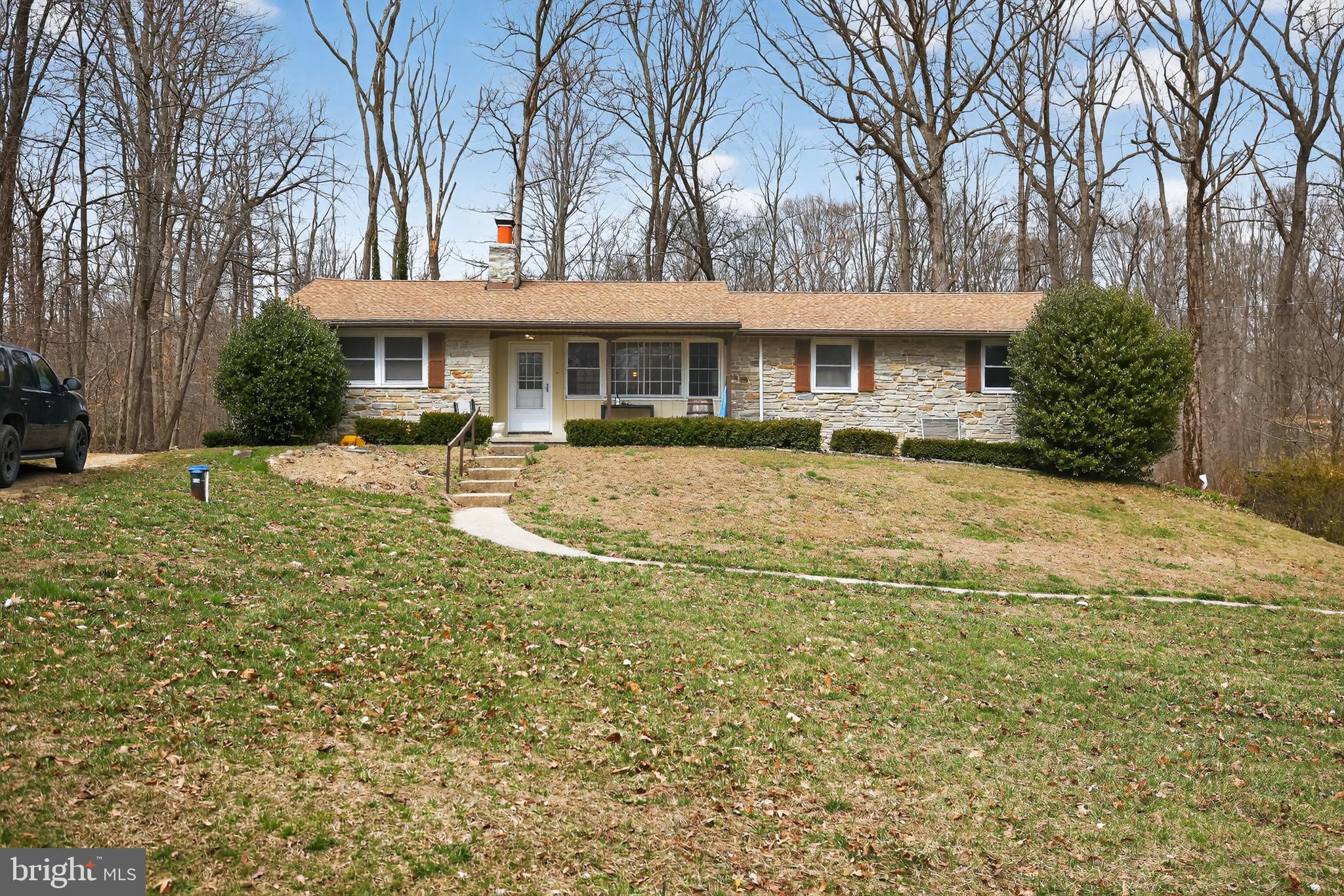 4144 Fox Trail Road Havre de Grace, MD 21078 - Photo 3 of 39 a front view of a building with a garden