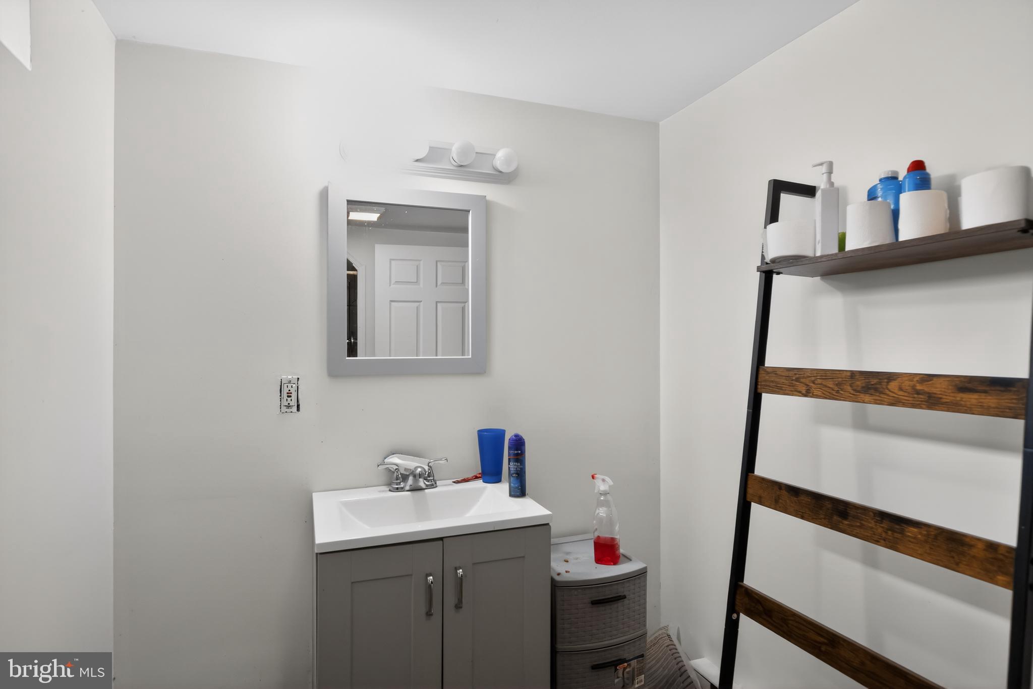 4144 Fox Trail Road Havre de Grace, MD 21078 - Photo 32 of 39 a bathroom with a sink and a mirror
