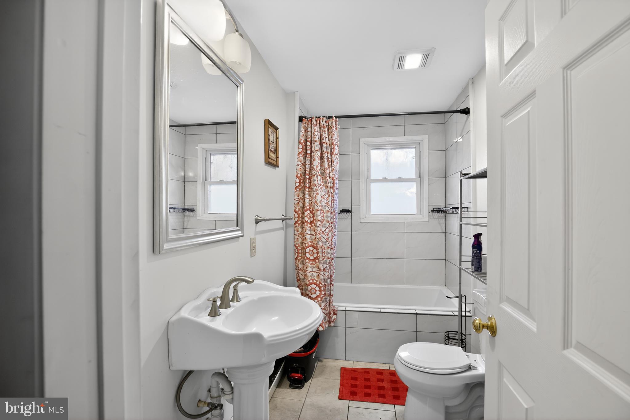 4144 Fox Trail Road Havre de Grace, MD 21078 - Photo 33 of 44 a bathroom with a sink toilet and shower