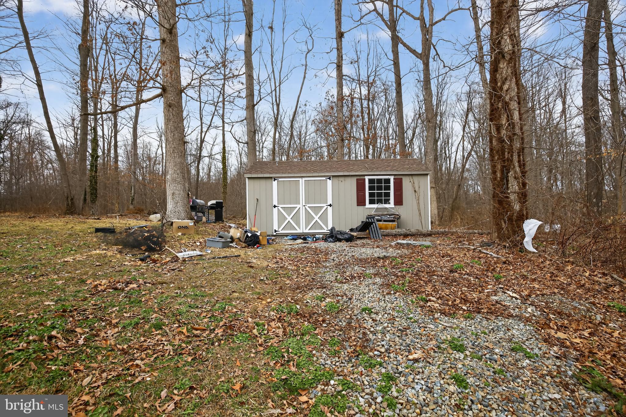 4144 Fox Trail Road Havre de Grace, MD 21078 - Photo 4 of 39 a backyard of a house with table and chairs