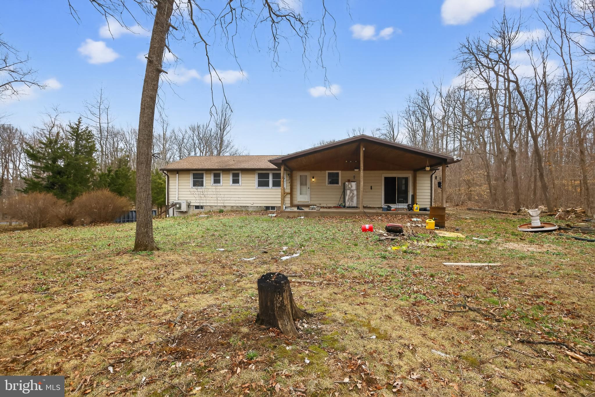 4144 Fox Trail Road Havre de Grace, MD 21078 - Photo 7 of 39 a backyard of a house with table and chairs
