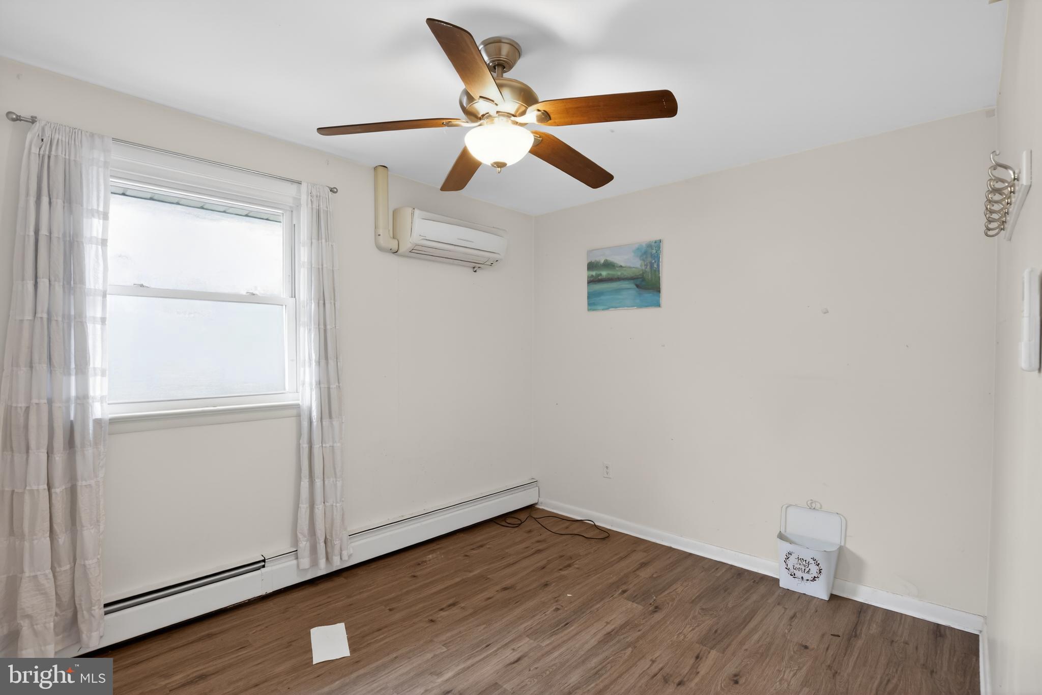 4144 Fox Trail Road Havre de Grace, MD 21078 - Photo 9 of 39 a view of an empty room with wooden floor