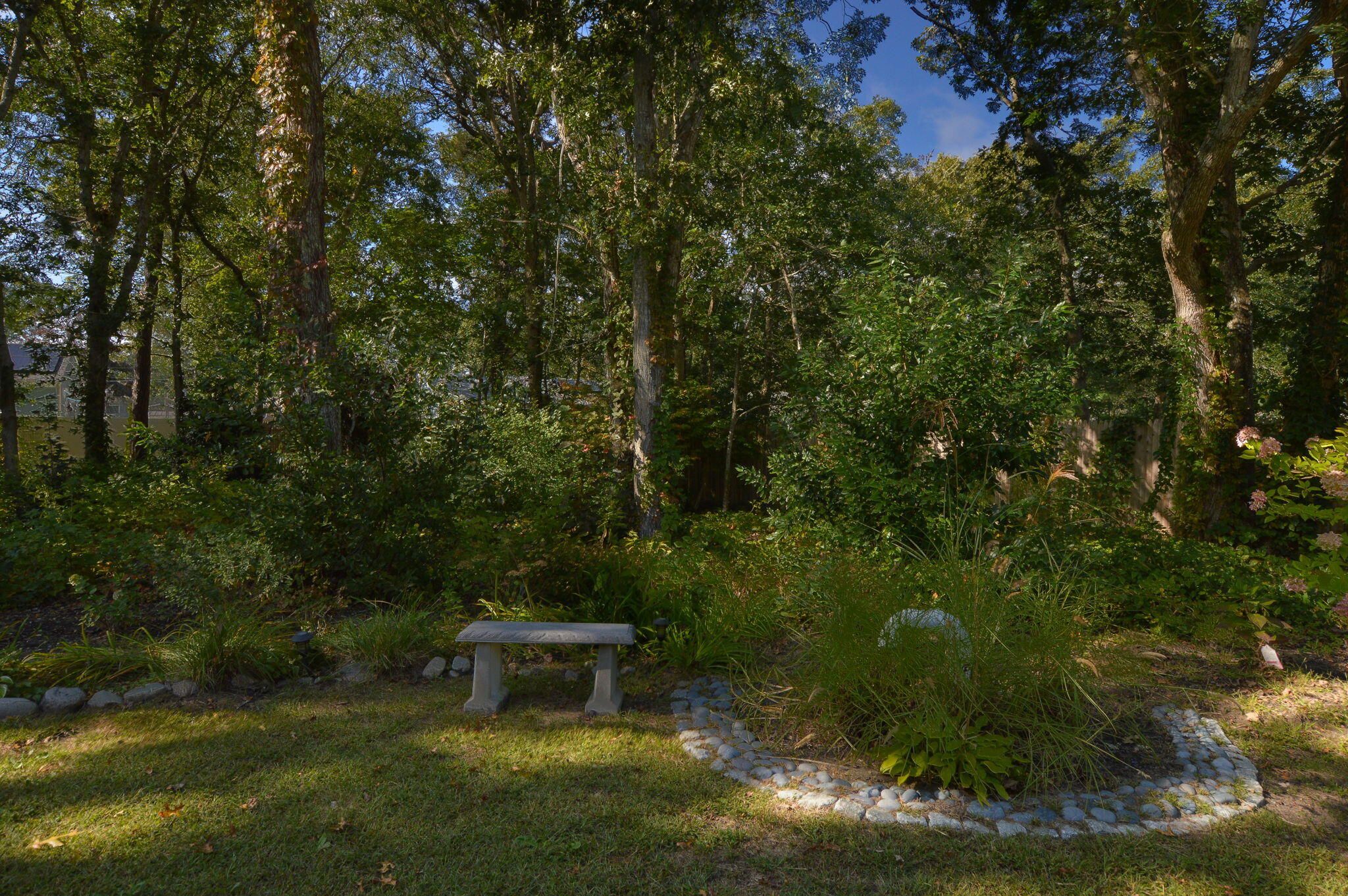 829 Pitcher's Way Hyannis, MA 02601 - Photo 23 of 32 a view of a backyard with sitting area