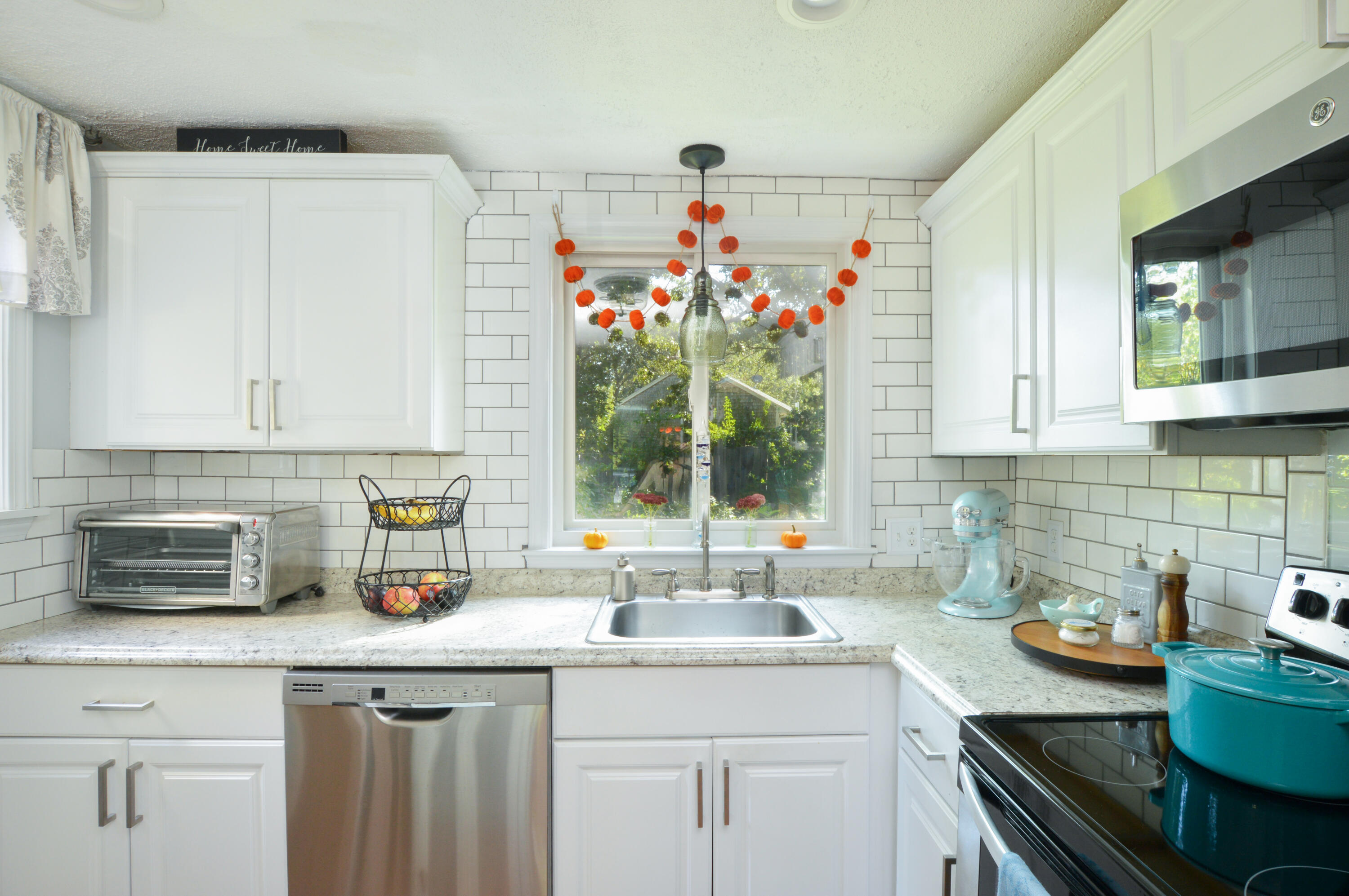829 Pitcher's Way Hyannis, MA 02601 - Photo 5 of 32 a kitchen with sink and cabinets