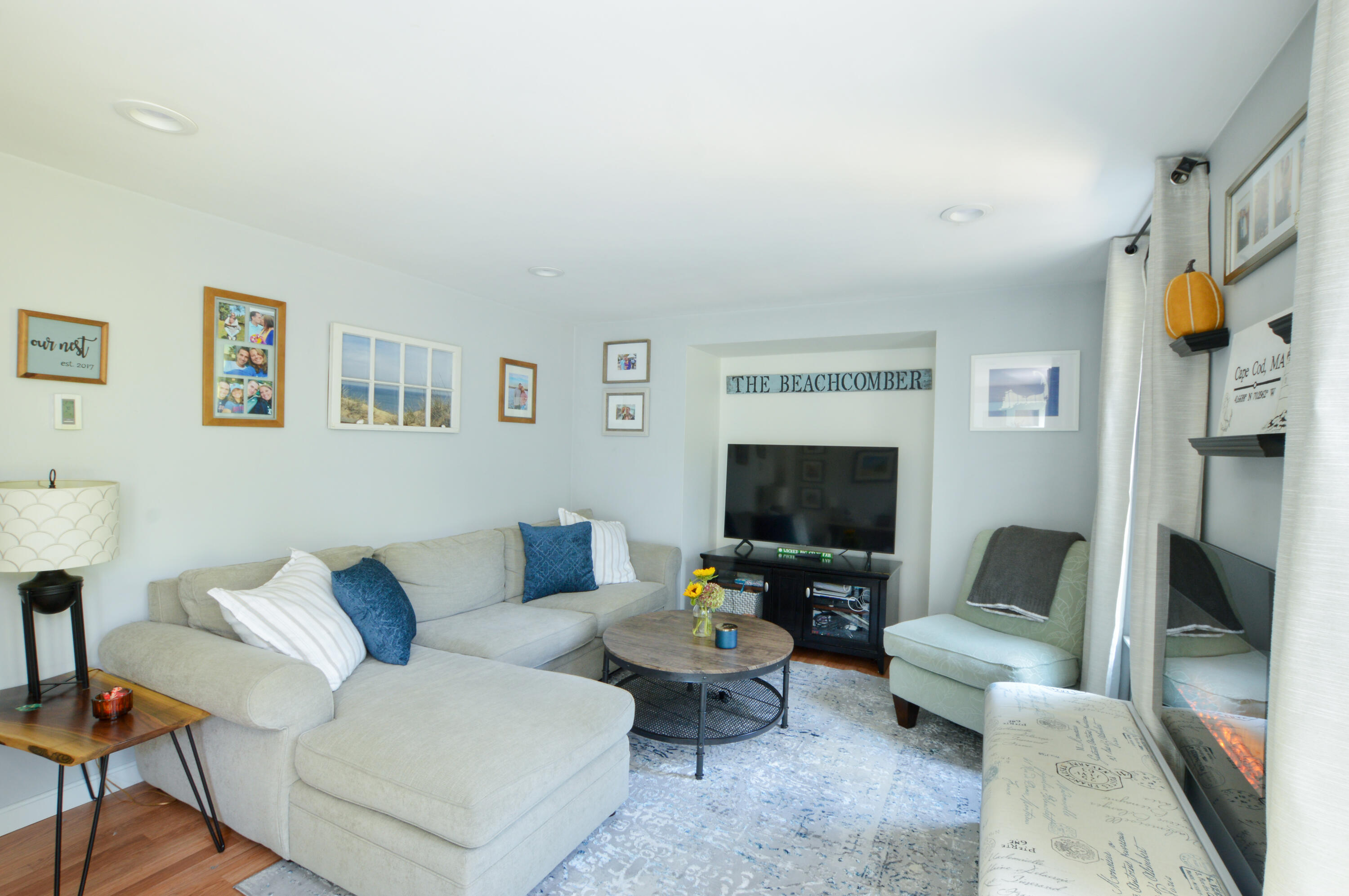 829 Pitcher's Way Hyannis, MA 02601 - Photo 10 of 32 a living room with furniture and a flat screen tv