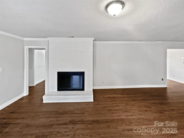 a living room with a fireplace