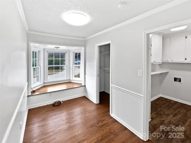 a view of livingroom with furniture wooden floor and window