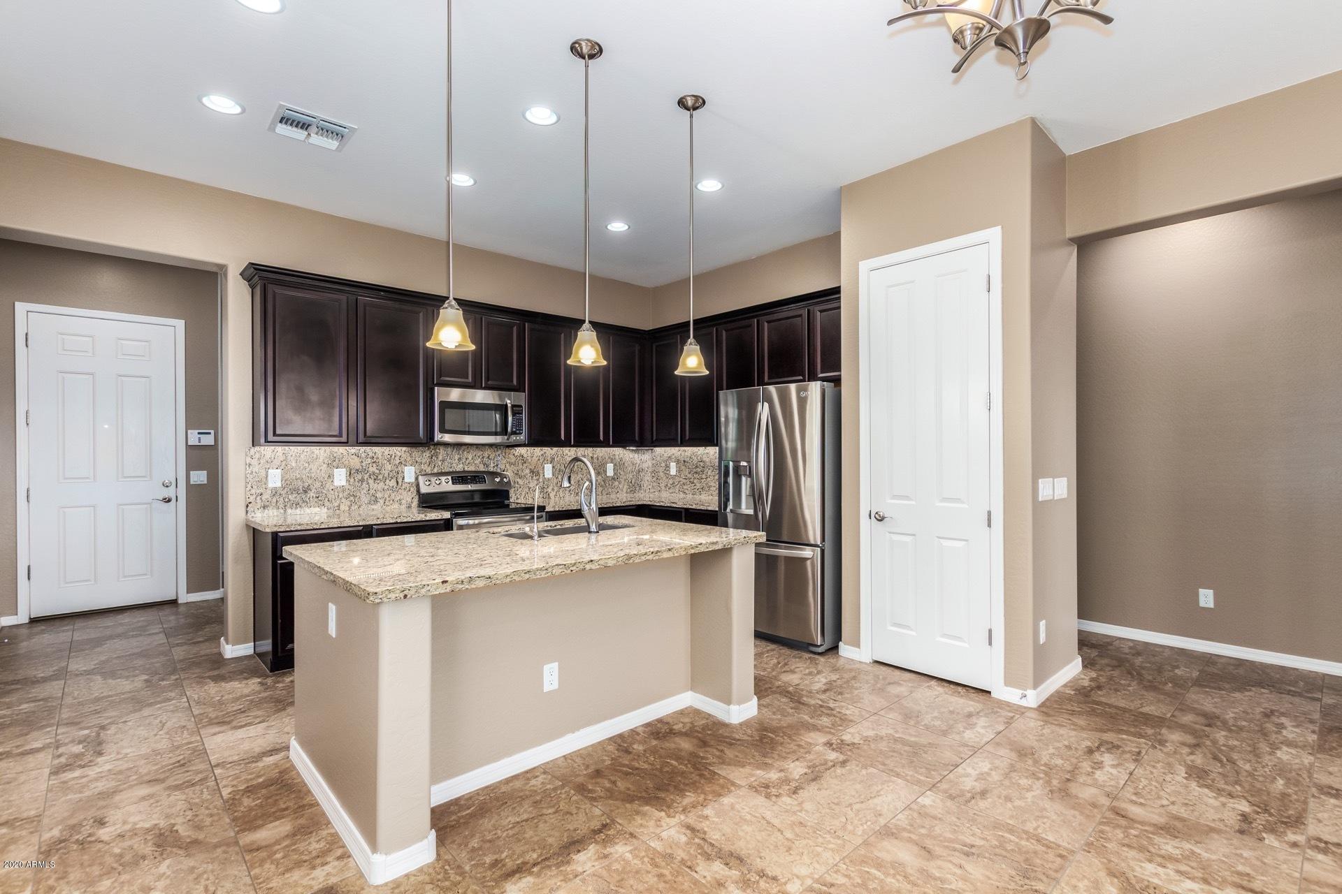 1489 East Hummingbird Way Gilbert, AZ 85297 - Photo 3 of 32 Open Kitchen