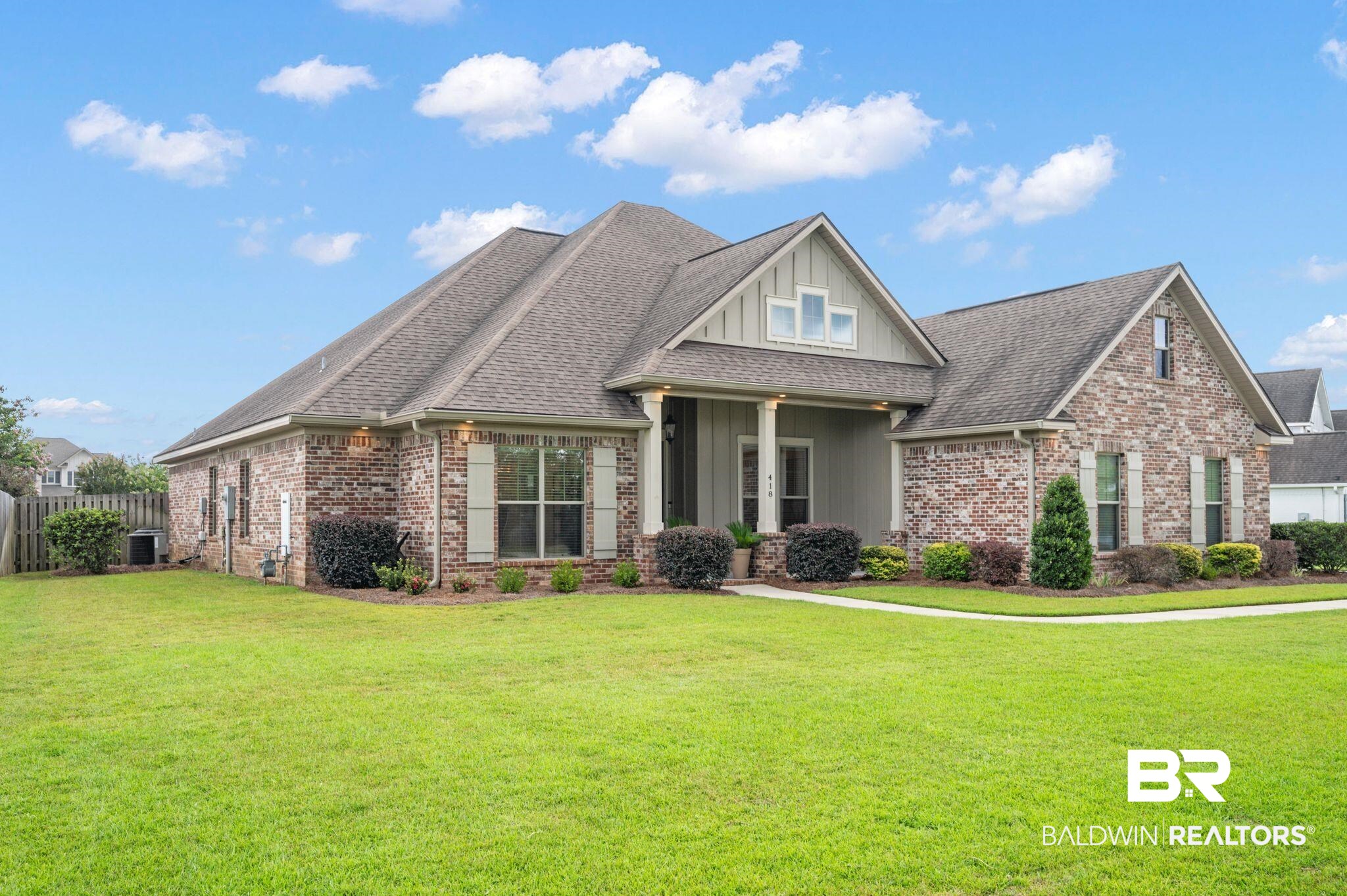 418 Fortune Drive Fairhope, AL 36532 - Photo 2 of 63 View of front facade with a front yard