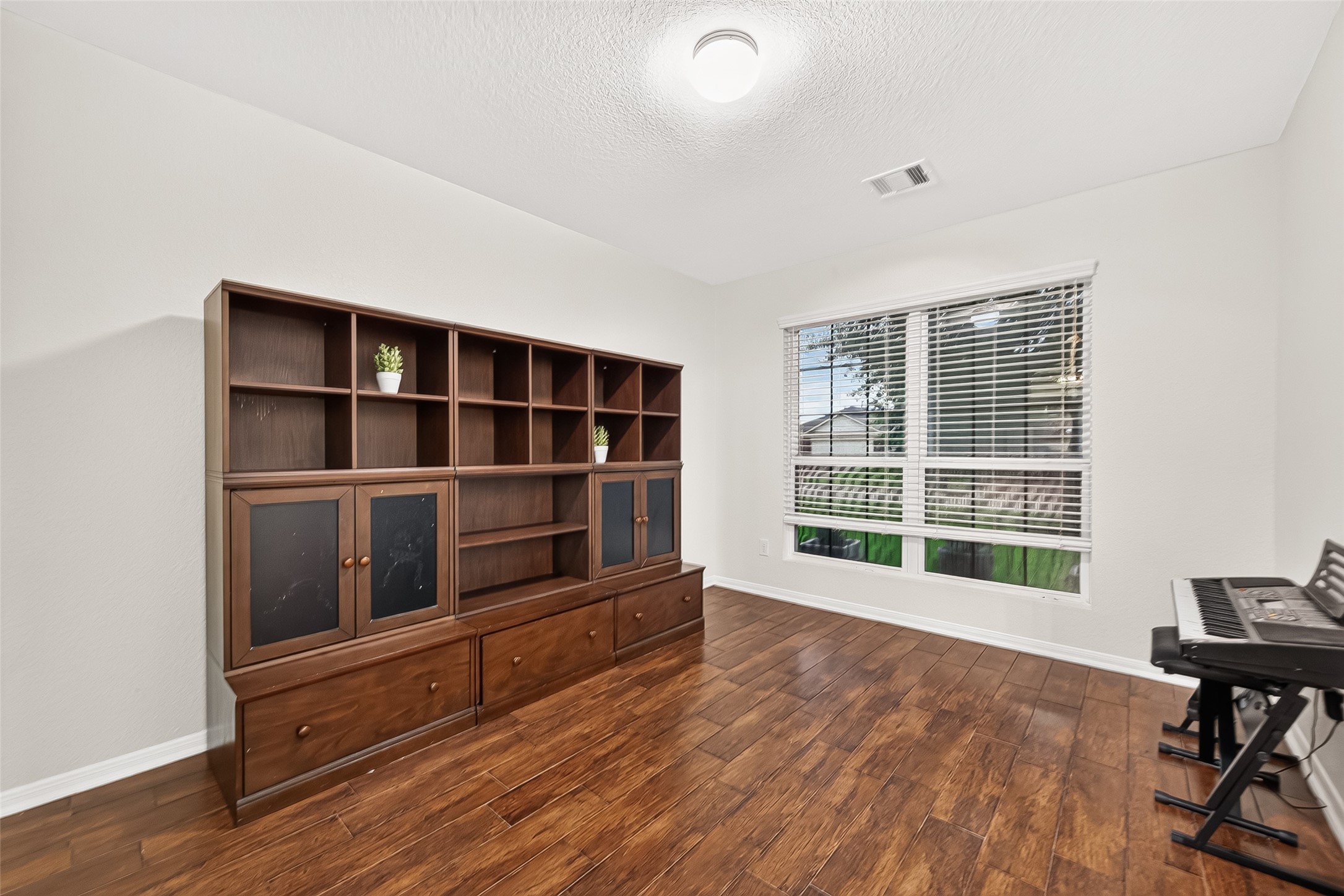 3155 View Valley Trail Katy, TX 77493 - Photo 6 of 50 Spacious secondary living area or study, offering a flexible layout perfect for a home office, library, playroom, or additional sitting area.