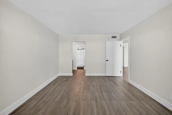 a bathroom with a sink a mirror and a shower