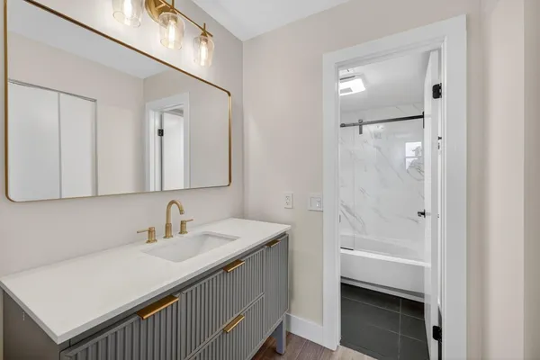 a bathroom with a shower and a toilet