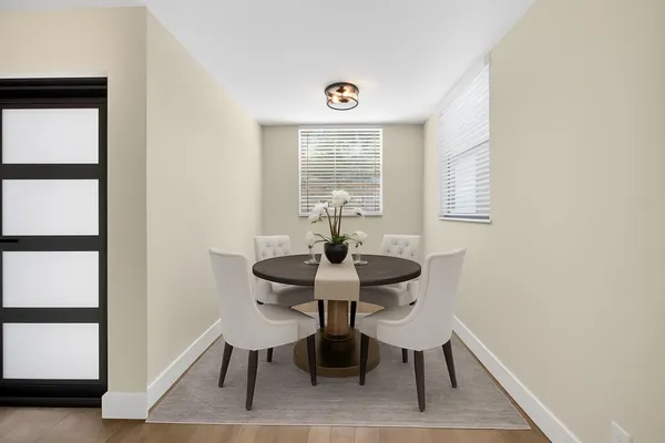 a workspace with furniture and window