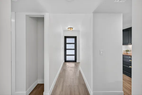 a bathroom with a glass door