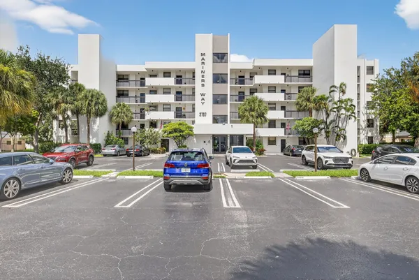 a view of swimming pool from a balcony