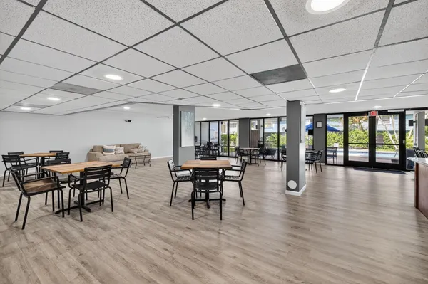 an aerial view of a houses and city street