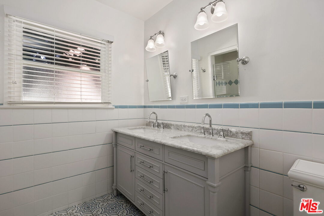 15415 Albright Street Pacific Palisades, CA 90272 - Photo 12 of 21 a bathroom with a sink and a toilet