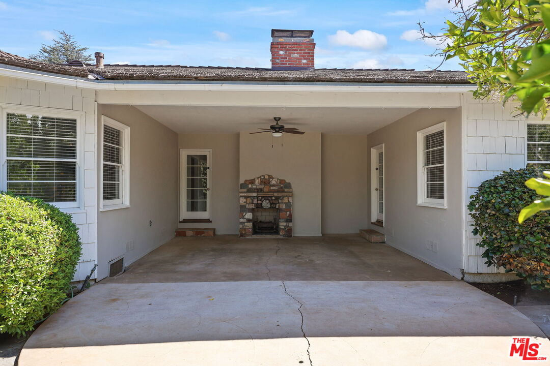 15415 Albright Street Pacific Palisades, CA 90272 - Photo 20 of 21 front view of a house with a hallway