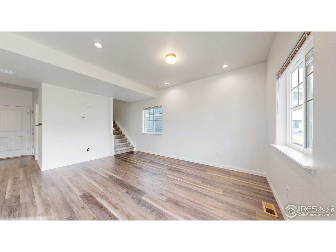 4355 24th Street Road, Unit 3202 Greeley, CO 80634 - Photo 12 of 33 LVP Flooring Throughout Main Level