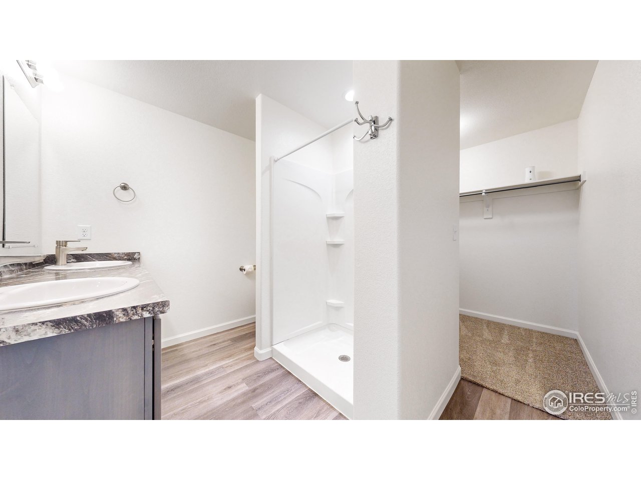 4355 24th Street Road, Unit 3202 Greeley, CO 80634 - Photo 16 of 33 Primary Ensuite with Walk-In Shower and Walk-In Closet