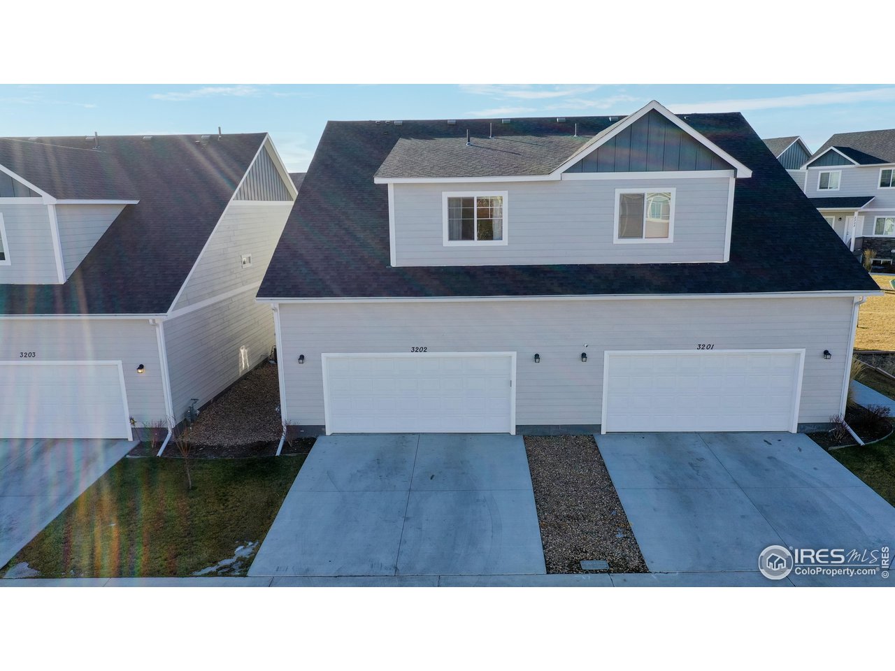 4355 24th Street Road, Unit 3202 Greeley, CO 80634 - Photo 30 of 33 Oversized 2 Car Garage with Driveway