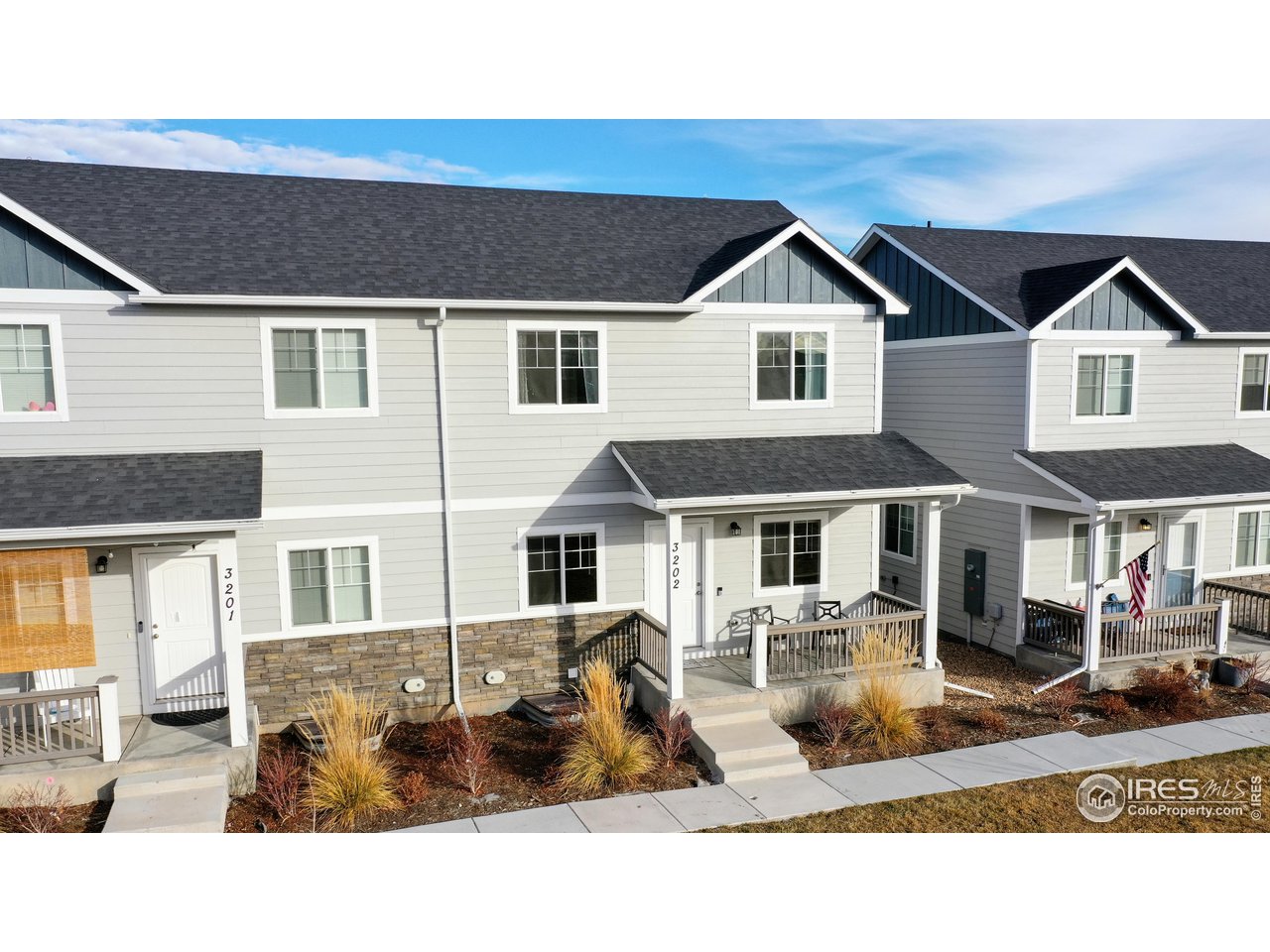 4355 24th Street Road, Unit 3202 Greeley, CO 80634 - Photo 8 of 33 Covered Front Porch Overlooks Greenbelt/Courtyard