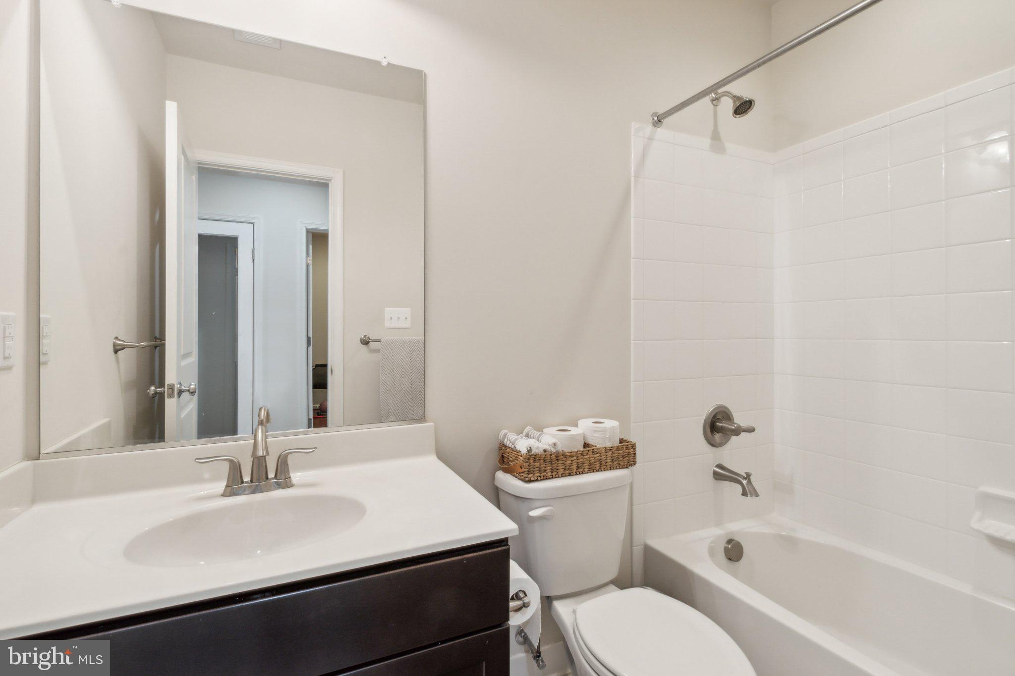 13305 Windy Meadow Lane Silver Spring, MD 20906 - Photo 21 of 25 Modern bathroom with sleek finishes.