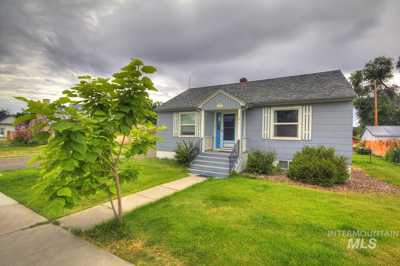 351 West Main Street South Vale, OR 97918 - Photo 2 of 33 Single-story residence featuring light blue siding with white trim and a contrasting blue entry door