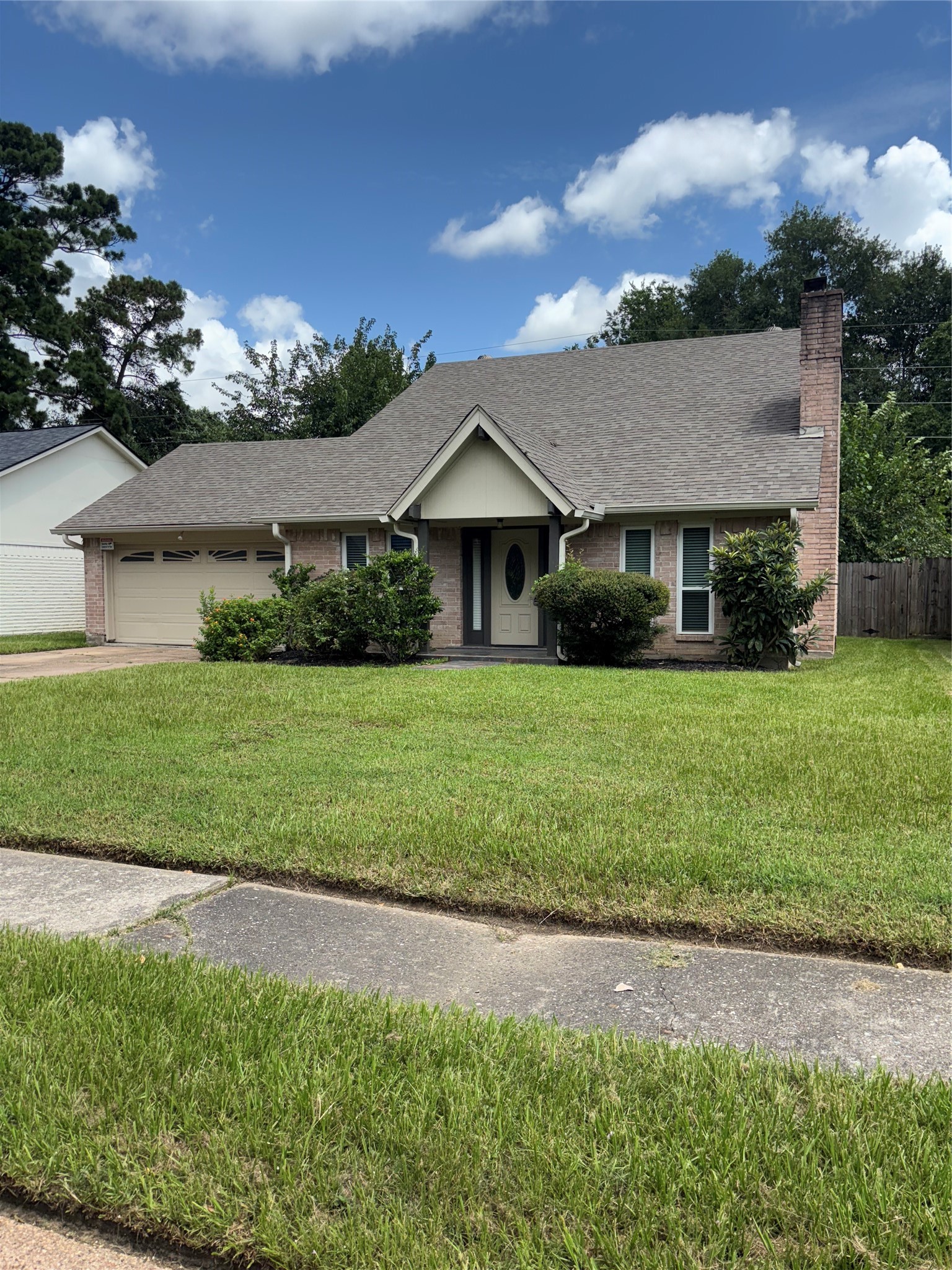 9626 Magnolia Ridge Drive Houston, TX 77070 - Photo 1 of 40 a front view of a house with a yard
