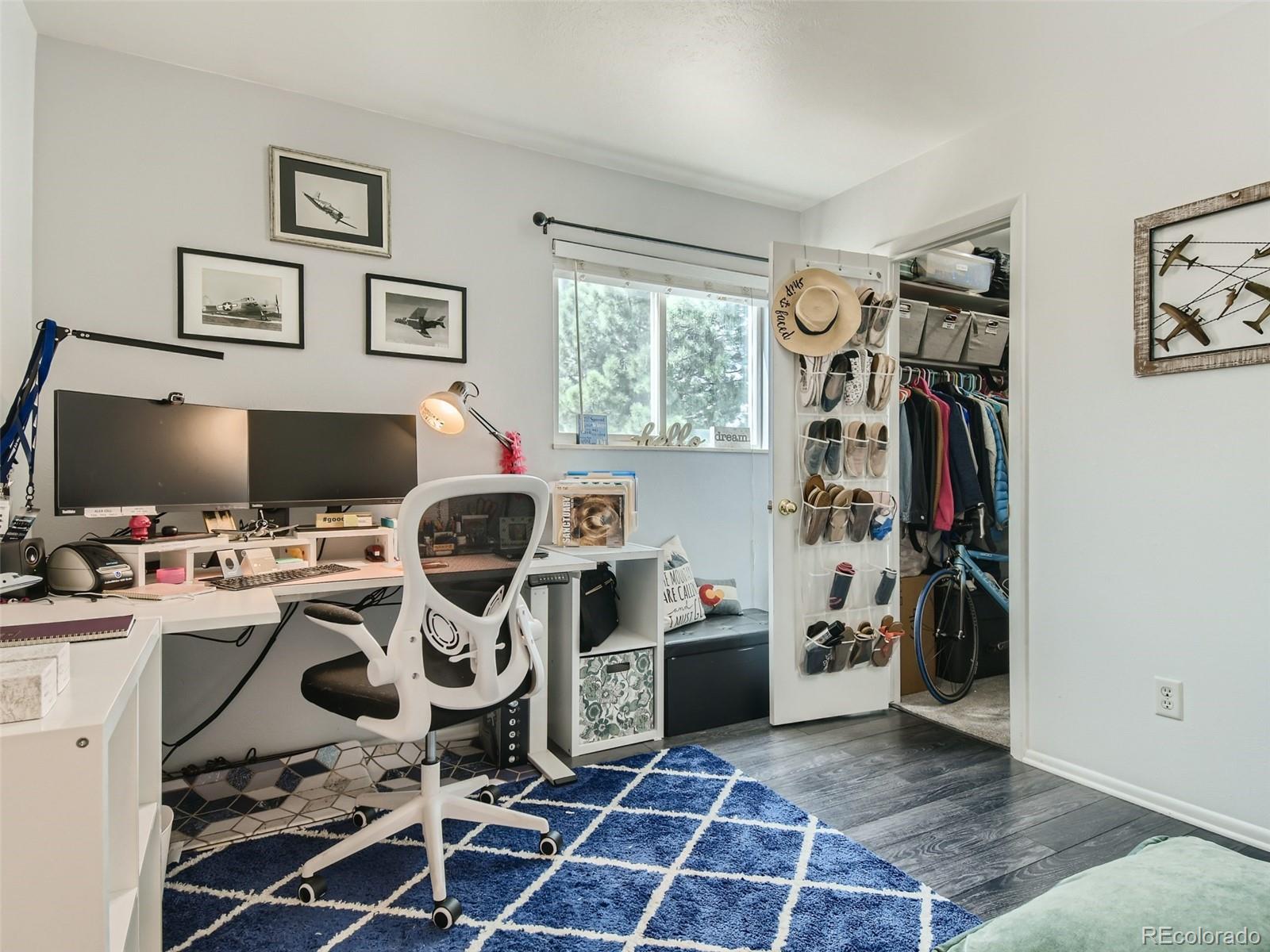 7994 Chase Circle, Unit 18 Arvada, CO 80003 - Photo 12 of 15 a view of a workspace with furniture and a window