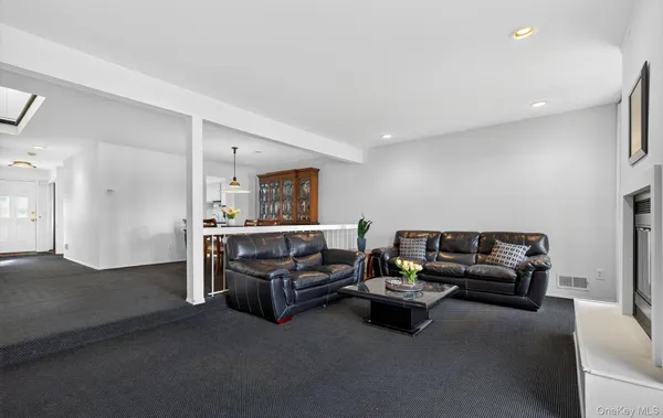 a living room with furniture and a couch