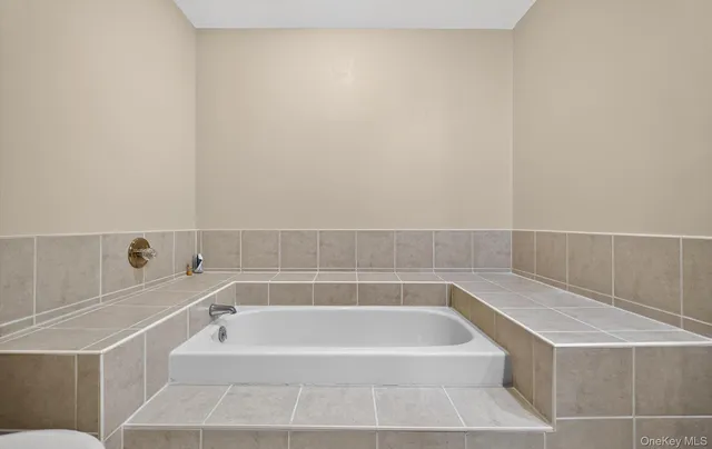 a view of a hallway with a closet