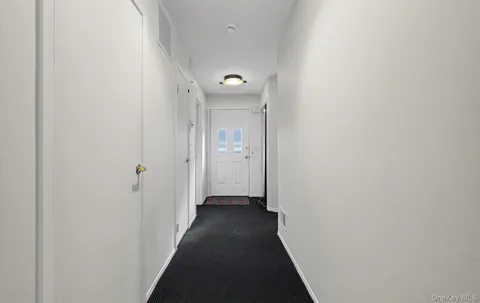 a view of a backyard with plants