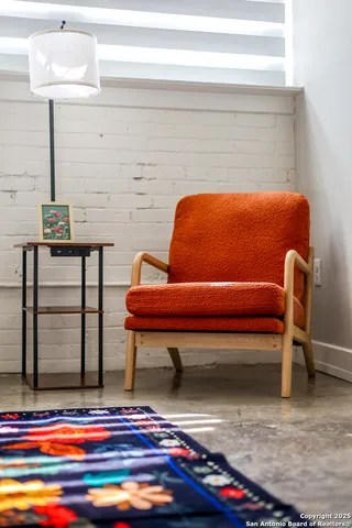 a bedroom with bed and window