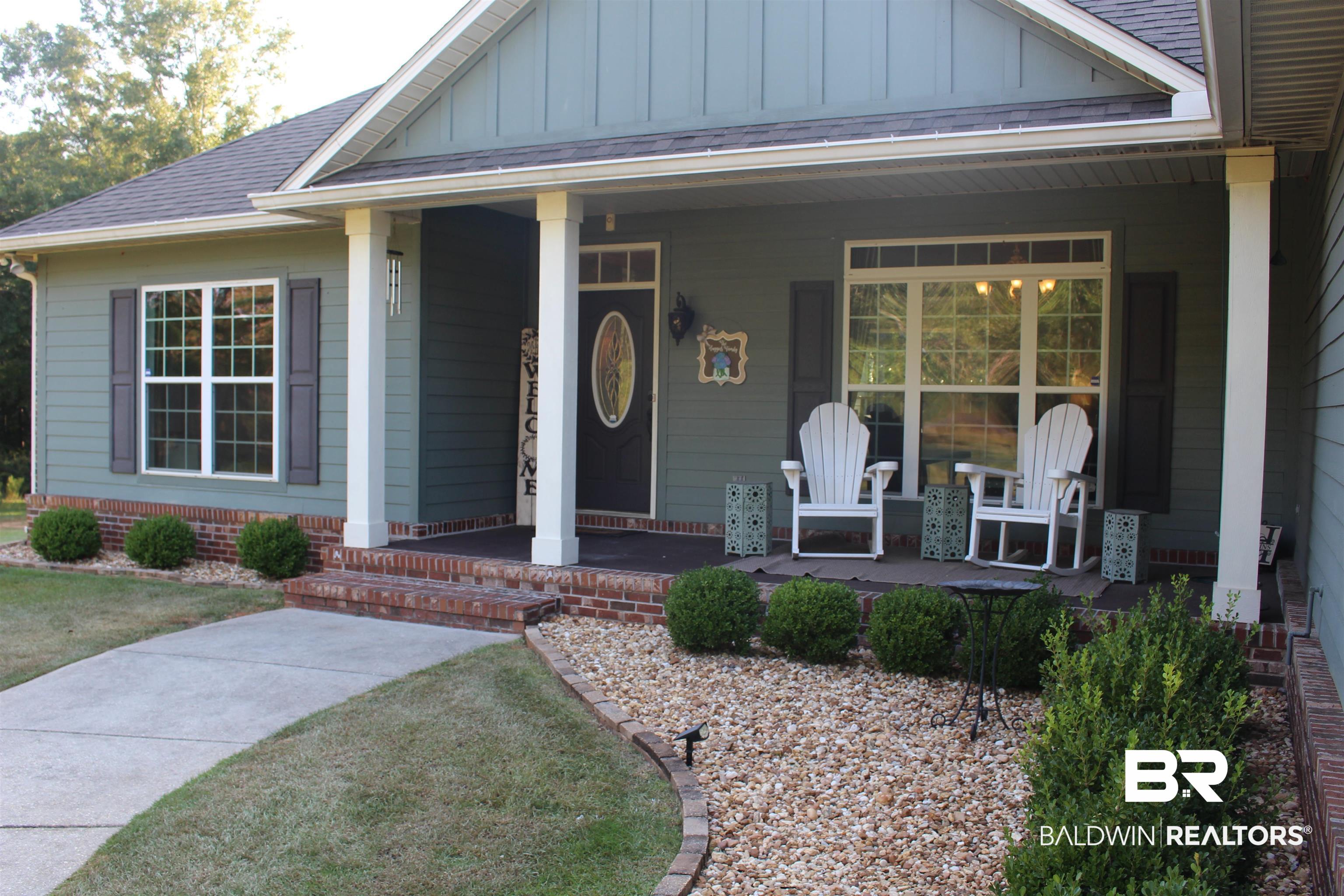 Entrance to property with a porch