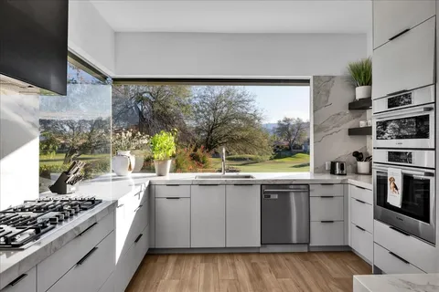a view of a lake from a window