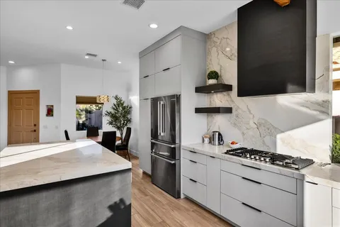 a view of a workspace with furniture and toys