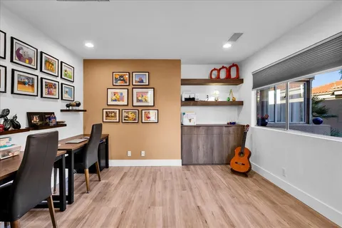 a bedroom with a large bed and a large closet