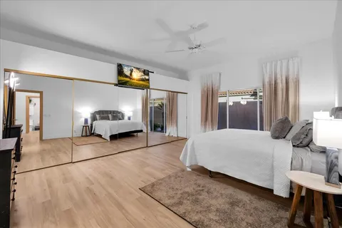 a bathroom with a glass shower door