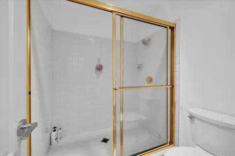 a bedroom with a bed and a closet