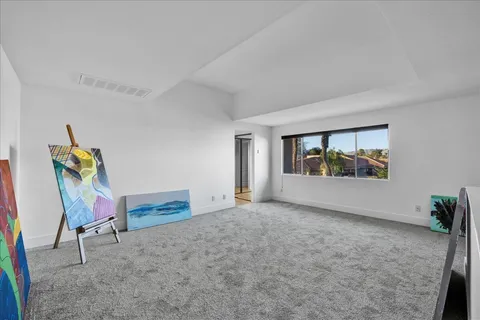 a view of swimming pool with a yard and sitting area