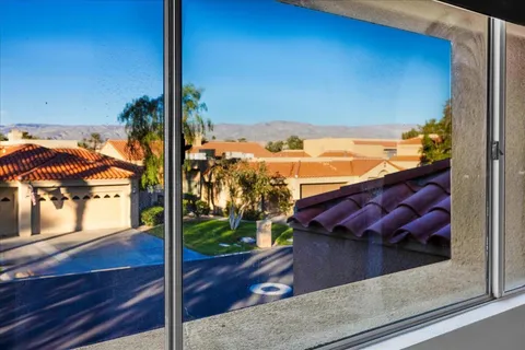 a view of swimming pool with a yard